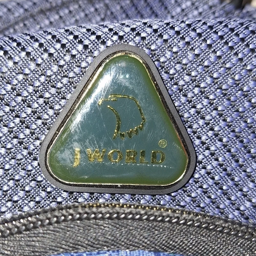 A J World backpack. It's pre-owned but still in great condition.